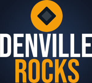 Denville Rocks logo: orange circle with a dark diamond above the bold white 'DENVILLE' and orange 'ROCKS' on a dark blue gradient background.